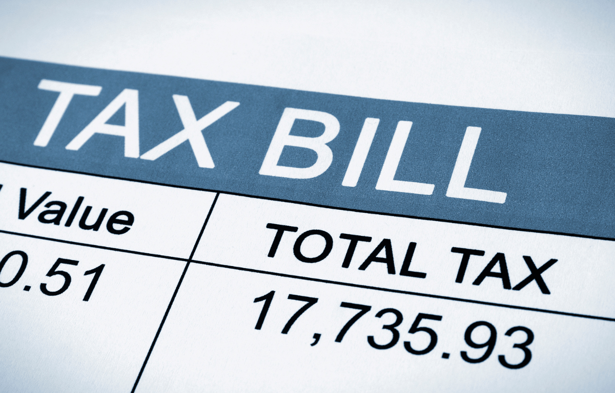Close-up of a tax bill showing a total tax amount of $17,735.93.